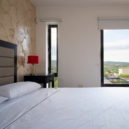 Alojamiento Cabana - dormitorio - vista a las sierras